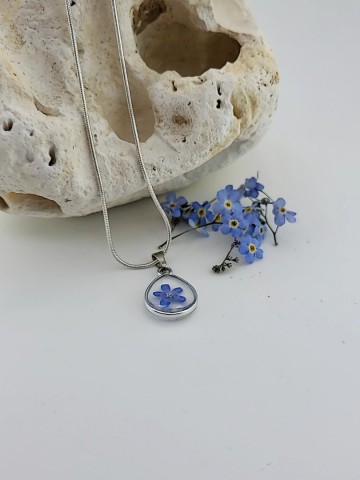 Unieke bloemen hars ketting