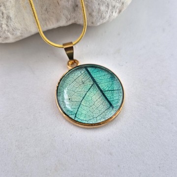 Goud kleurige blad skelet hanger