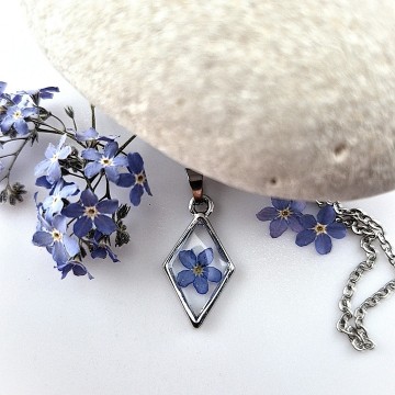 herinneringssieraad met betekenisvolle bloemen