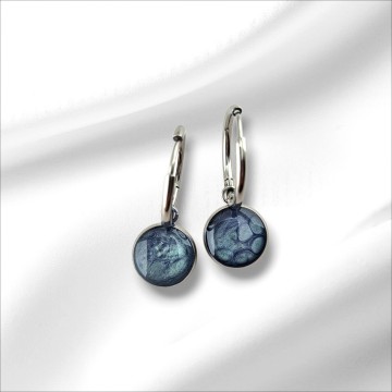 Rvs cabochon oorbellen hangend in het oor