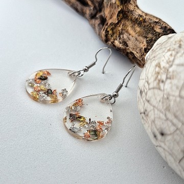 Transparante epoxy oorbellen met blad goud